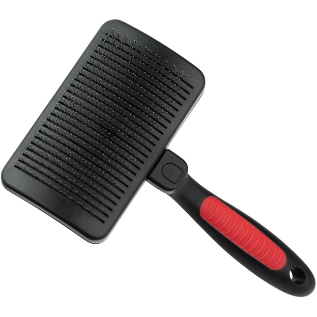 Ideal Dog self-cleaning poodle brush for dogs.