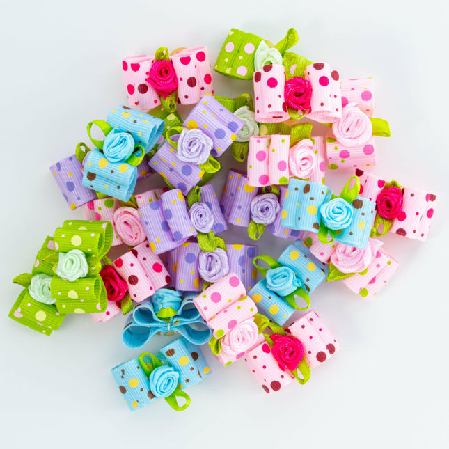 Blovi Bows Dots 25 pcs - elegant bows in colorful polka dots with a rose, on an elastic band, for dogs.