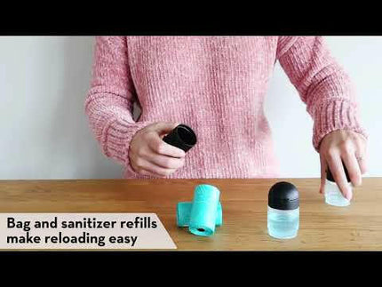 KONG Mini HandiPOD Interchangeable Starter Kit - dog waste bag dispenser set with disinfectant liquid and flashlight.